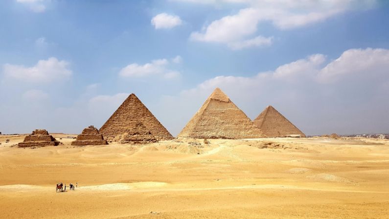 Giza Pyramids - brown pyramid under blue sky during daytime