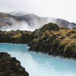 Blue Lagoon - landscape photography of river in the middle of mountains