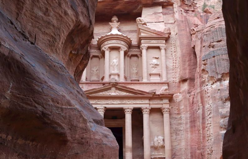 Ancient Petra - a building built into the side of a cliff